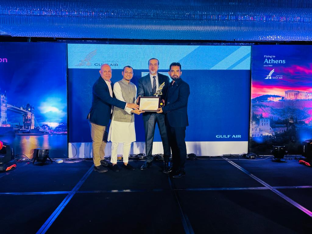 TripSatisfy receiving the Top Agent Award from Gulf Air